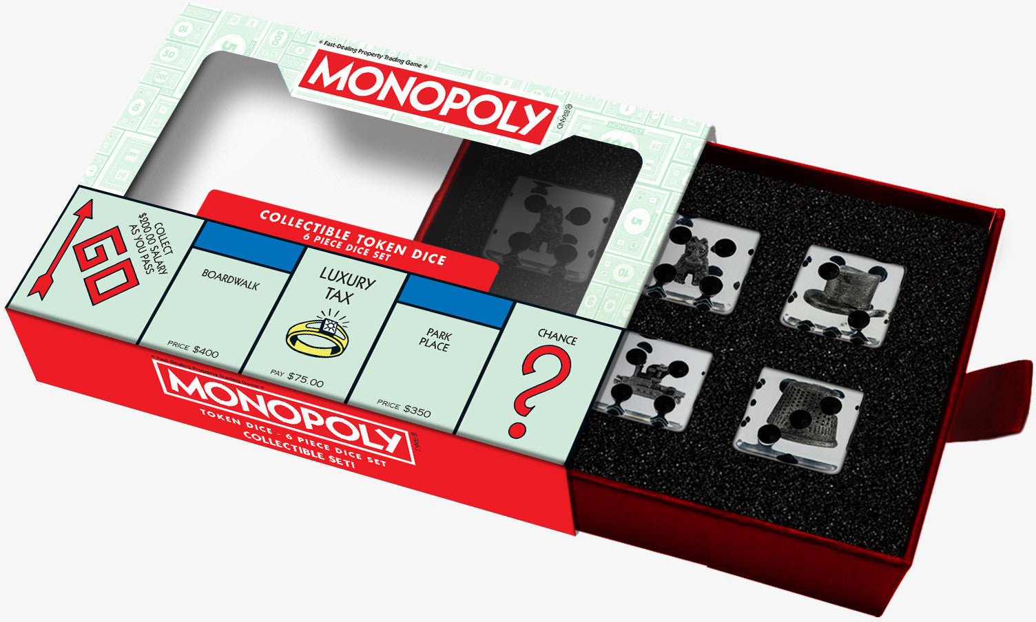 An open collectible Monopoly Dice and Token Set box shows game board spaces on the lid and four transparent dice with embedded classic tokens in black foam