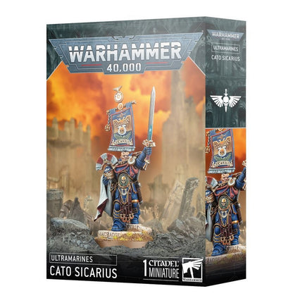 Warhammer 40K Cato Sicarius miniature box, Ultramarine figure raising sword and banner on ruins