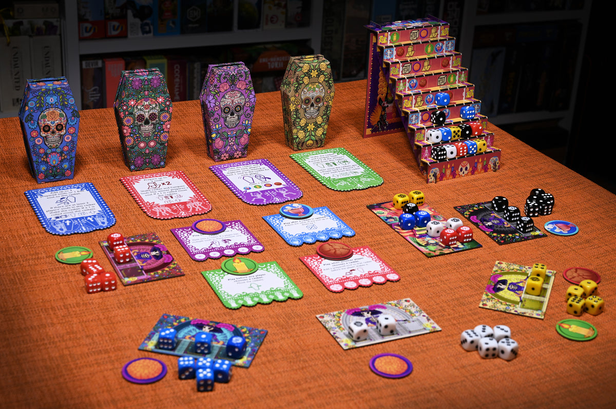 Close-up of colorful dice and decorated game boxes