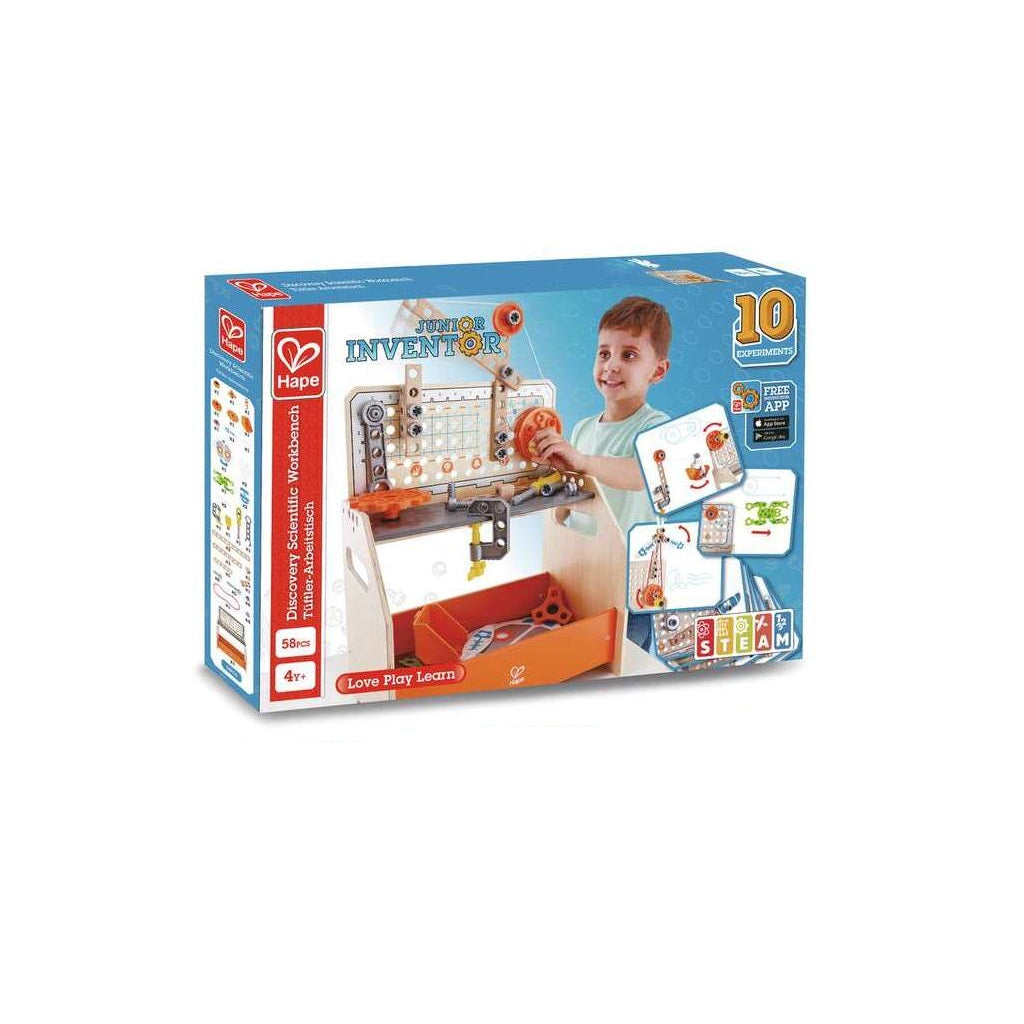 The retail packaging for the Hape Junior Inventor 58-piece Discovery Scientific Workbench toy set featuring a boy playing and the STEAM logo