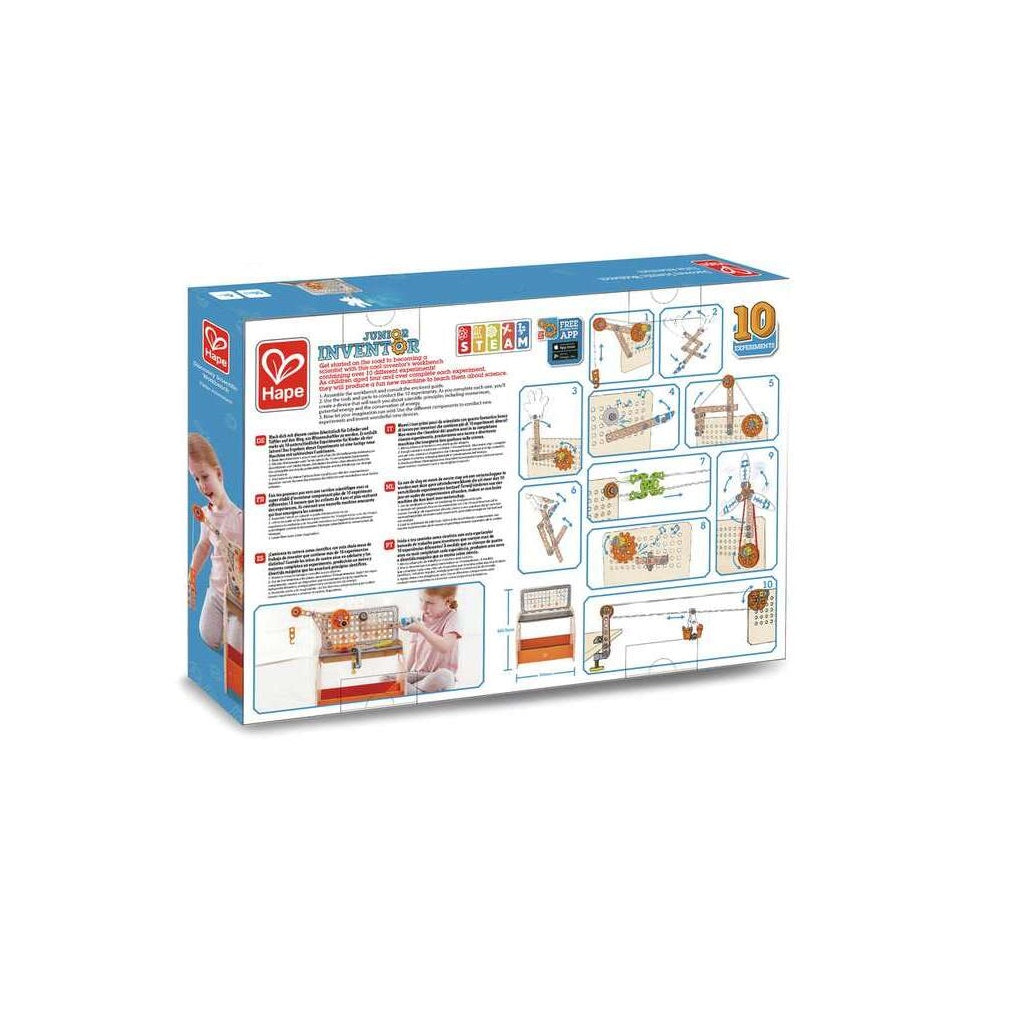 Back panel of the Hape Junior Inventor STEAM kit box showing diagrams for 10 distinct experiments and photos of children using the completed workbench toy