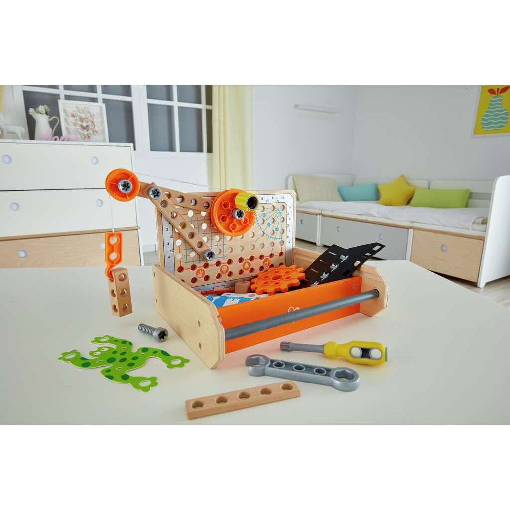 The wooden Science Experiment Toolbox features a crane model constructed with orange pulleys and wood pieces, displayed next to a wrench, screwdriver, and loose parts