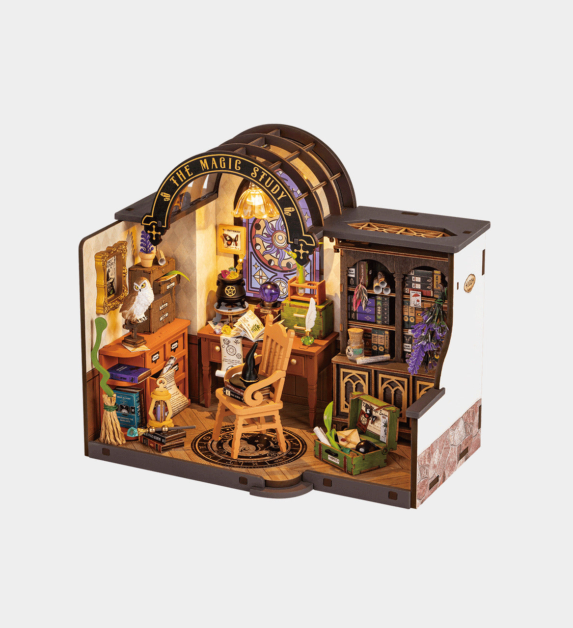A miniature Diy Mini House The Magic Study assembled model features an intricate wizard's office with a desk, cauldron, bookshelf, and arched sign