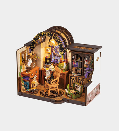 A miniature Diy Mini House The Magic Study assembled model features an intricate wizard's office with a desk, cauldron, bookshelf, and arched sign