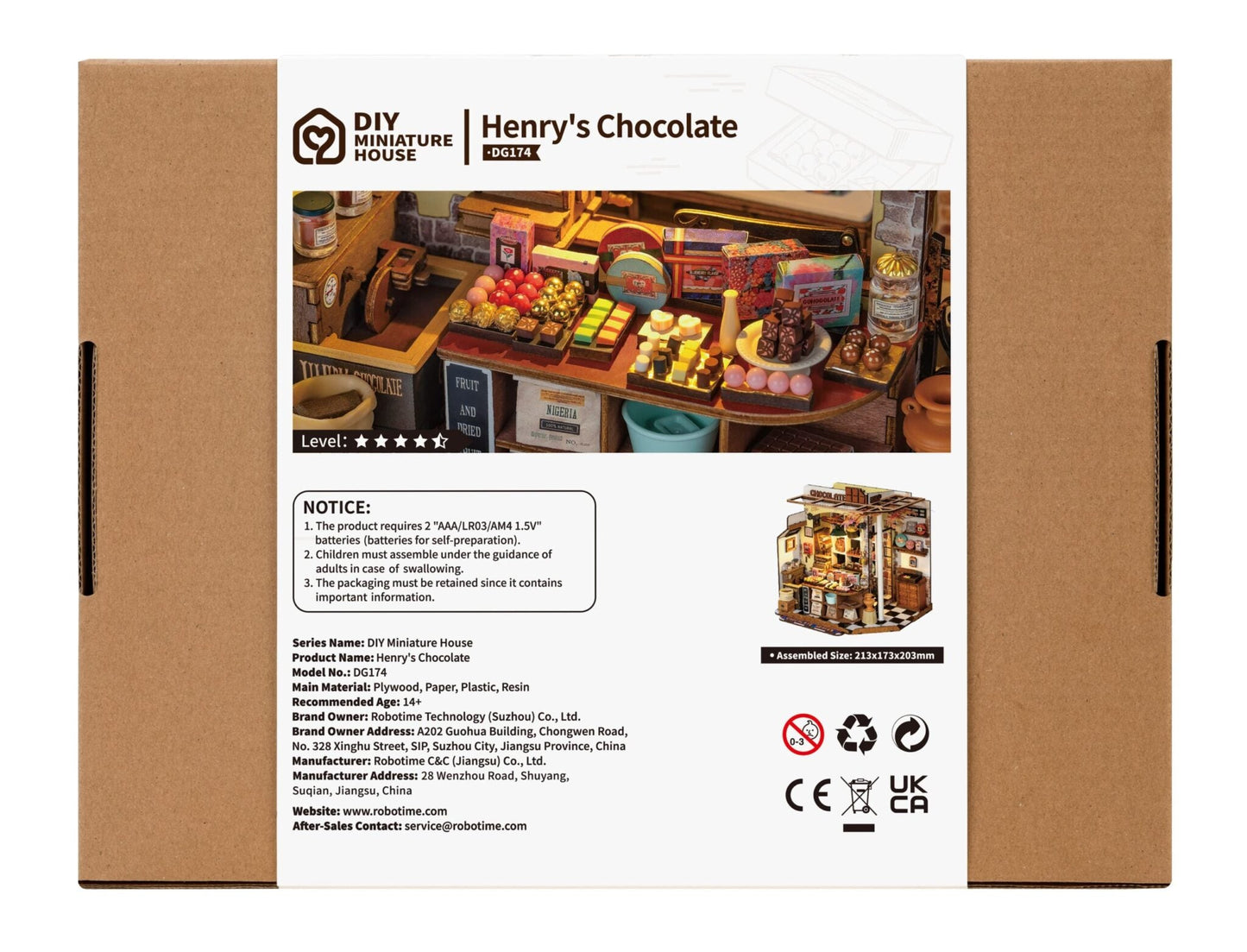 The retail box for the DG174 Henry's Chocolate DIY miniature house kit shows a detailed shop display overflowing with colorful candies and truffles, with an assembled size of 213x173x203mm