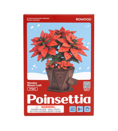 The red and blue packaging highlights the Rowood Poinsettia Wooden Bloom Craft kit containing 153 pieces recommended for ages 8 and up