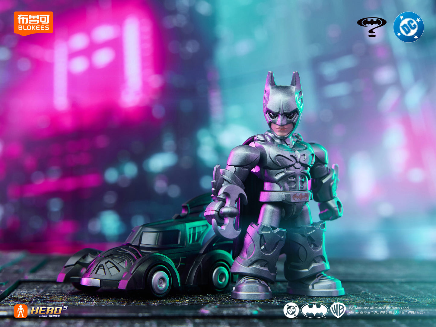 Stylized, armored Batman figure and Batmobile toy on a rooftop with dramatic pink and teal neon city lights
