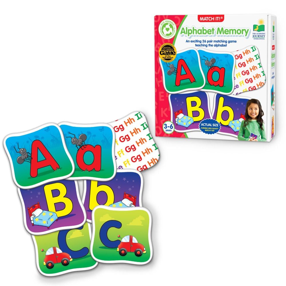 Match It! Alphabet Memory game box and scattered playing cards showing letters A, B, and C with related illustrations like ants and cars