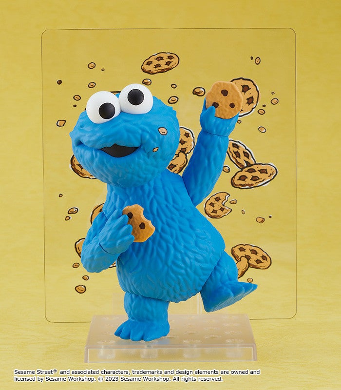 Seated Nendoroid Cookie Monster eating a cookie