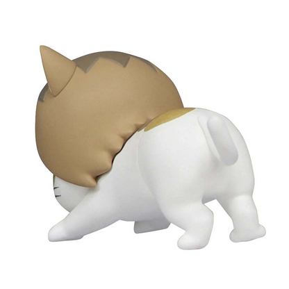 Chubby white and brown striped cartoon cat figurine with a bent pose