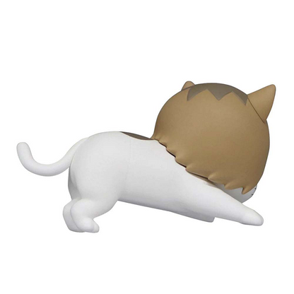 Cute white and brown plush cat stretching with tail curled
