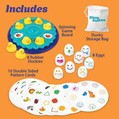 Dizzy Duckies game components: spinning blue board, 8 yellow rubber ducks, ghost-shaped eggs, and pattern cards