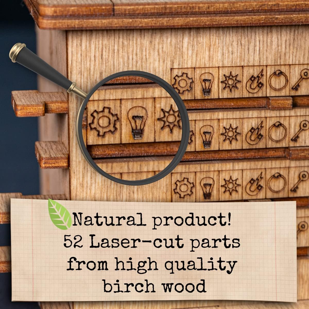 Magnifying glass highlights laser-cut gear and lightbulb symbols on a wooden model
