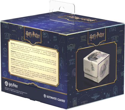 Harry Potter Ultimate Guard deck box packaging. Dark blue box with celestial design showcases the light-colored card holder