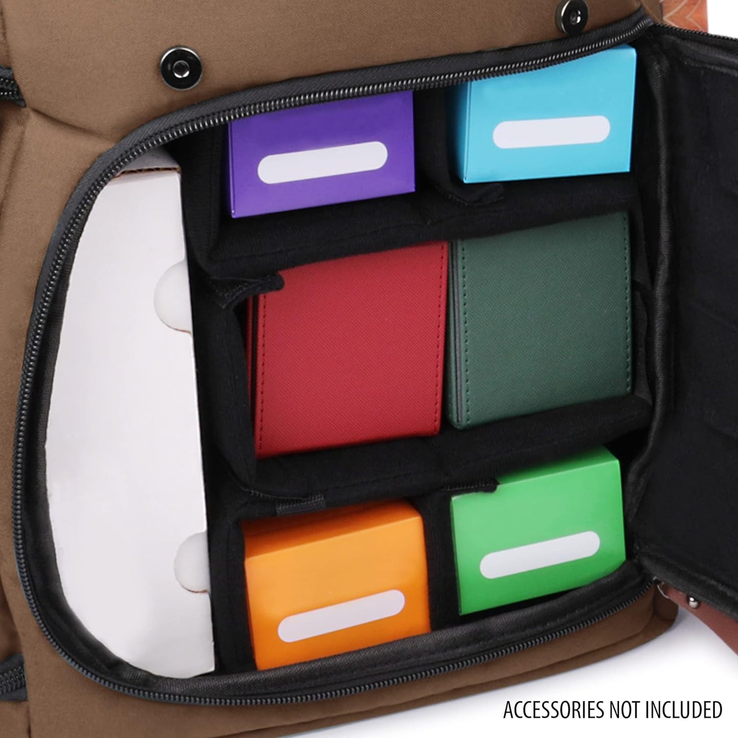 An open brown bag's interior shows padded dividers filled with colorful card or game cases.