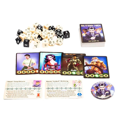 Button Men game items: a stack of cards, character cards, a pile of dice, rule cards, and a round pin