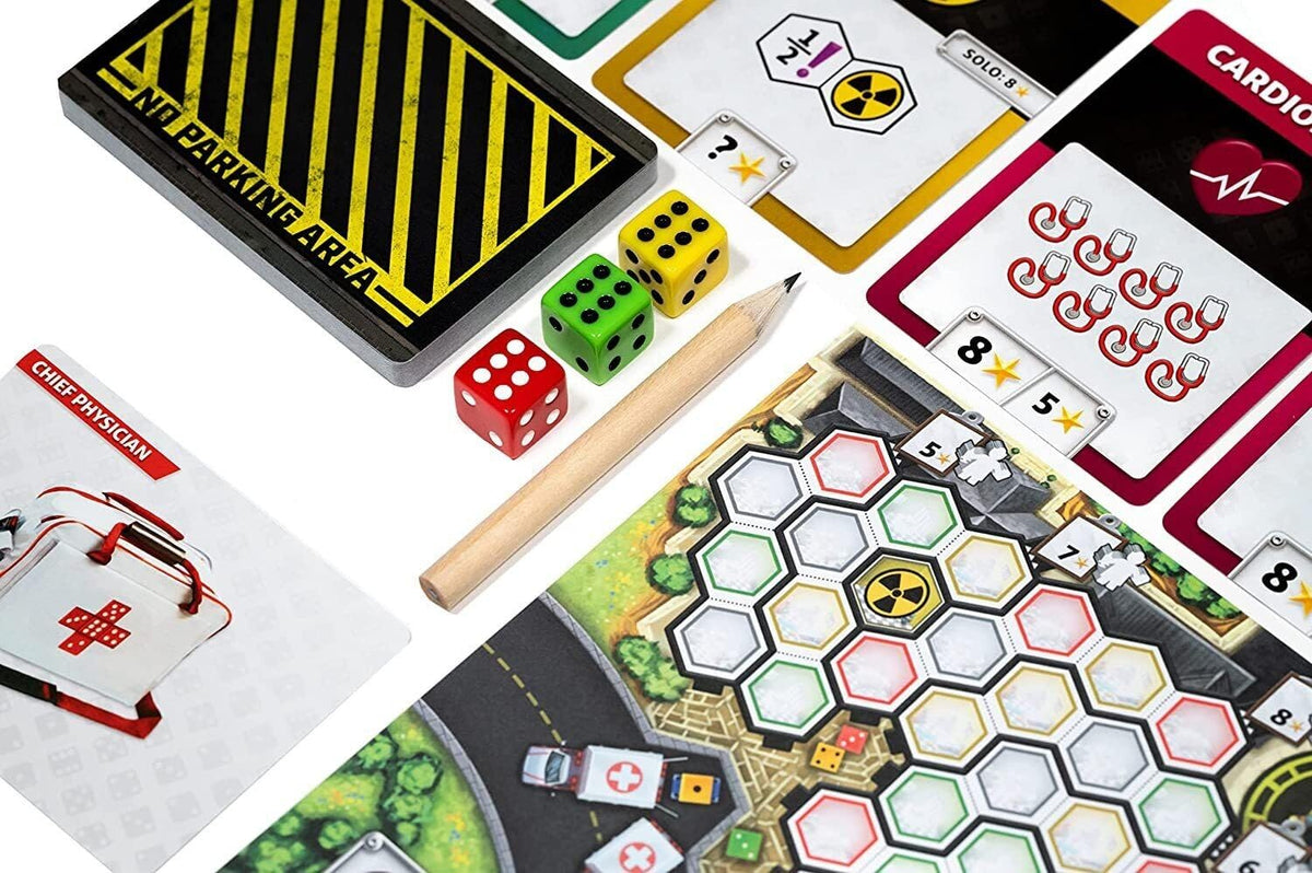 Top-down view of a board game No Parking Area cards, dice, pencils and hex-grid game board with ambulances and medical symbols