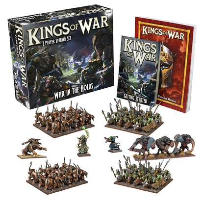 Kings of War 2-player starter set with its game box, rulebooks, and various fantasy miniature armies