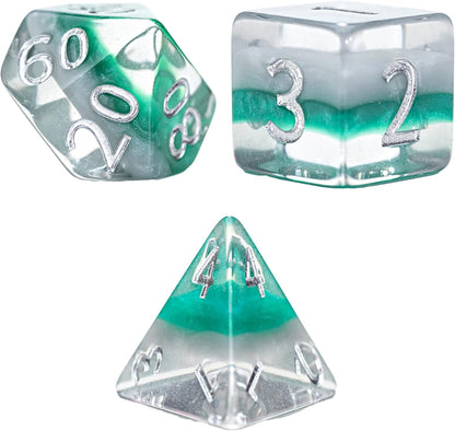 Three clear polyhedral dice (d4, d6, d20) with green & white layers and silver numbers