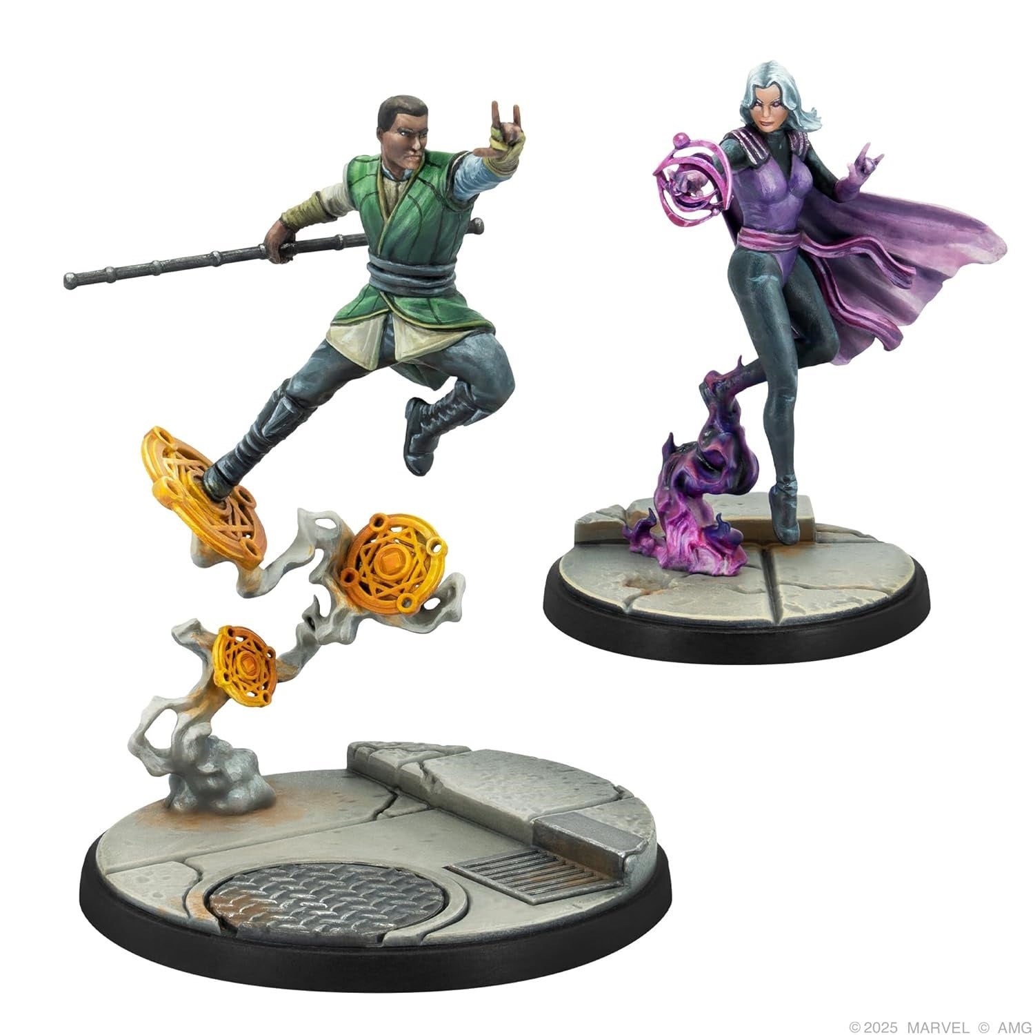 Marvel miniatures: Man floating on magic discs with a staff, and a woman casting a purple mystical spell
