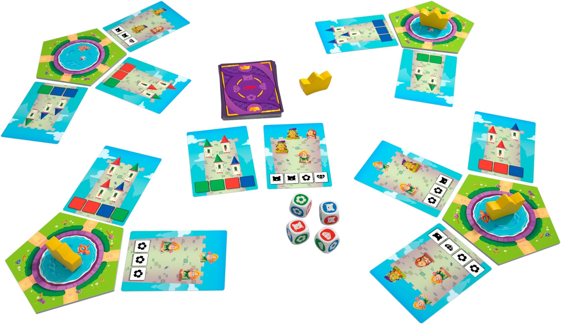 Colourful board game pieces are spread out: castle tiles, character cards, hexagonal pond tiles with yellow crowns, a card deck, and four symbolic dice.