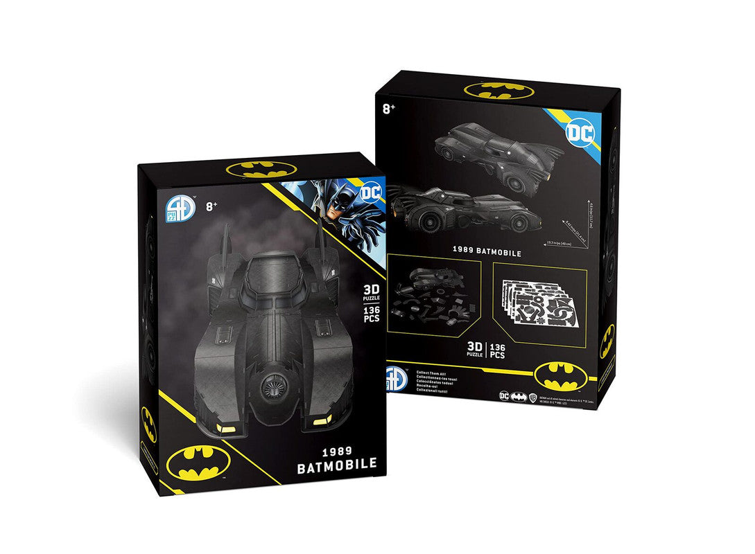 Batman 1989 Batmobile 3D puzzle kit with 136 pieces featuring the iconic black car on two display boxes with Batman character art and assembly components