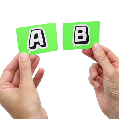 Hands holding green cards marked with A and B speech bubbles