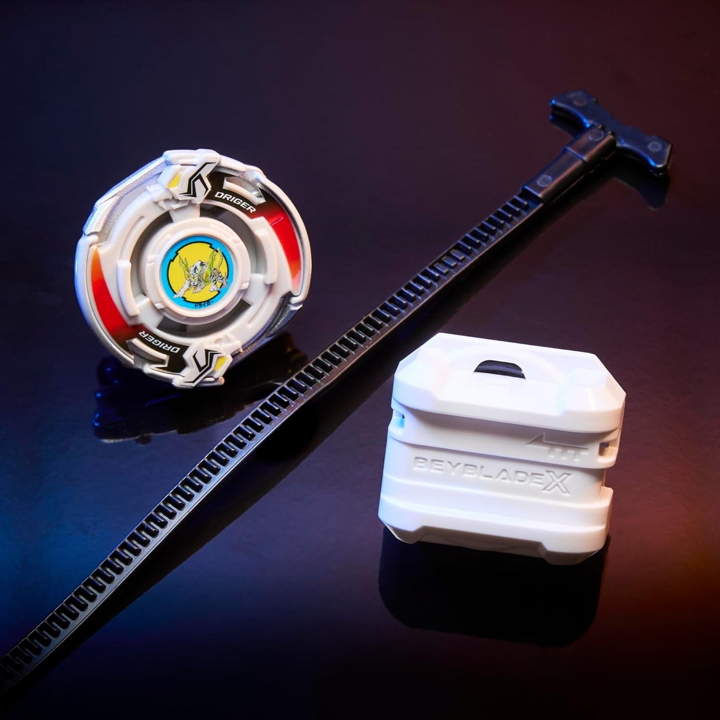 Driger Beyblade top, ripcord launcher and white Beyblade X case