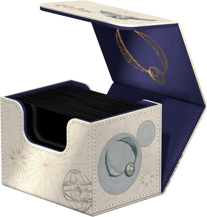 Open trading card deck box decorated with Golden Snitch art, filled with black cards
