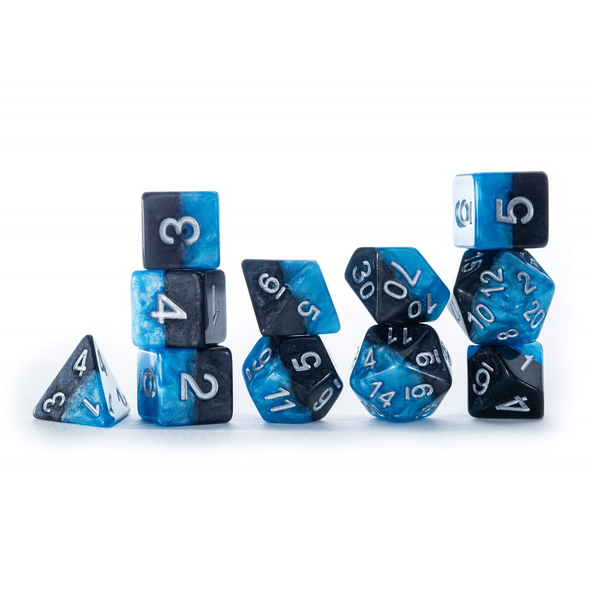 A set of black and shimmery blue split-colour polyhedral dice, some stacked, on a white background.