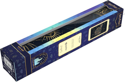Harry Potter playmat rolled in dark blue packaging. Gold celestial artwork is visible through the box window