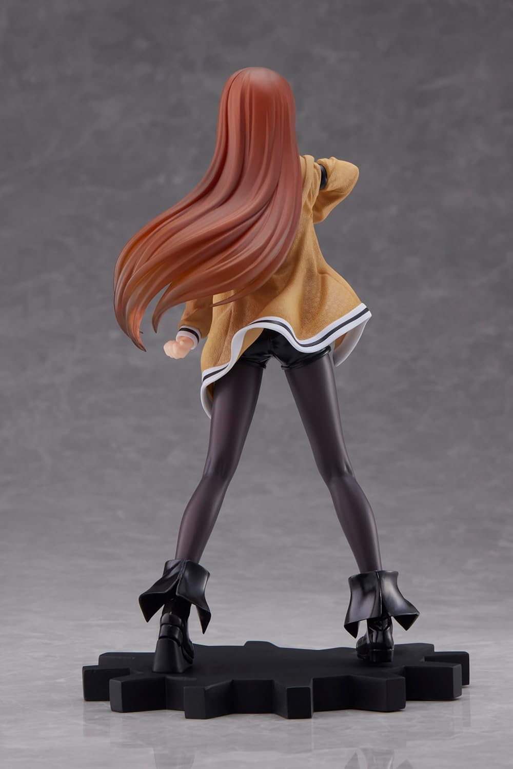 Back angle of Kurisu Makise figure showing coat and long hair movement