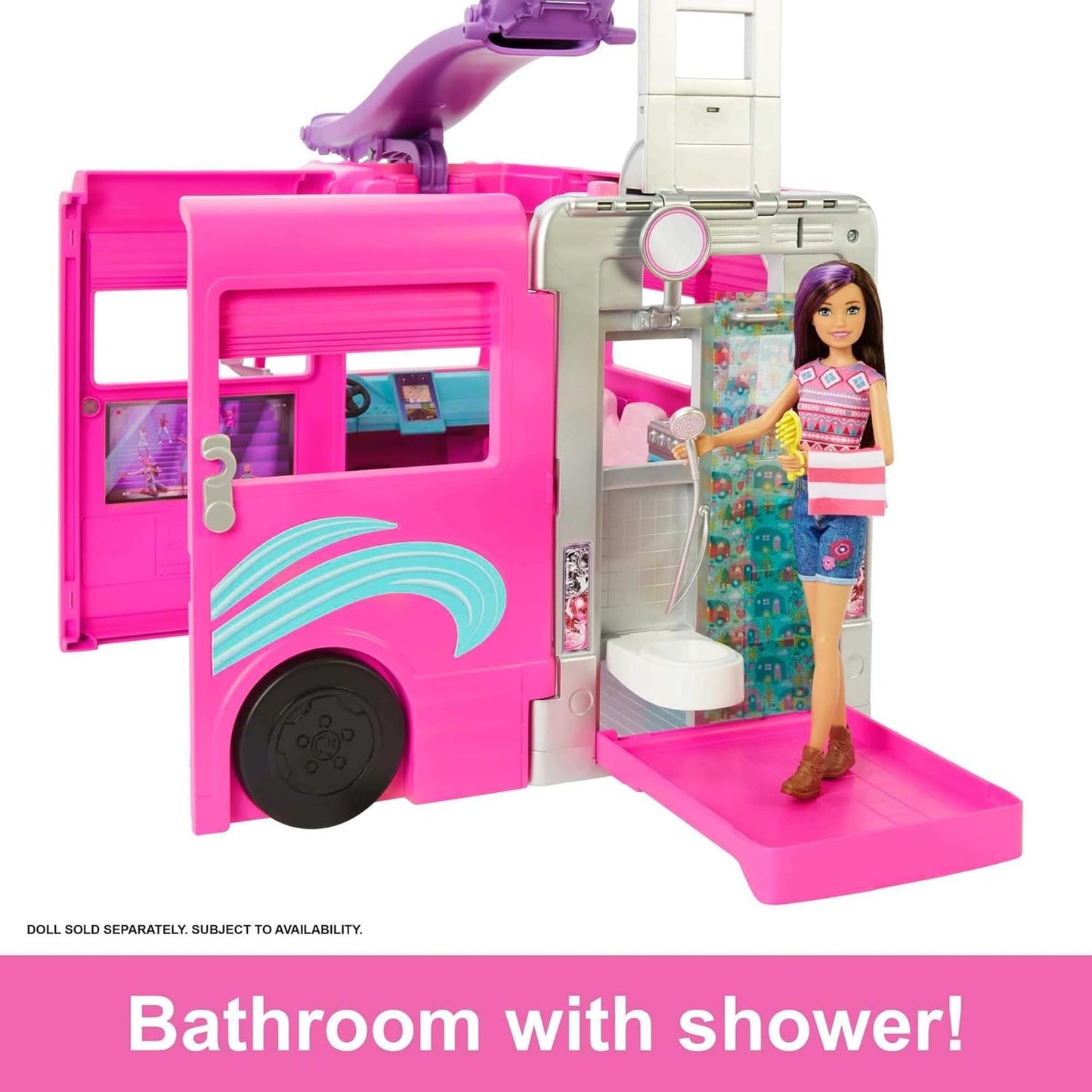 Barbie doll with purple-streaked hair stands in a pink camper's bathroom -  holding a shower head and towel
