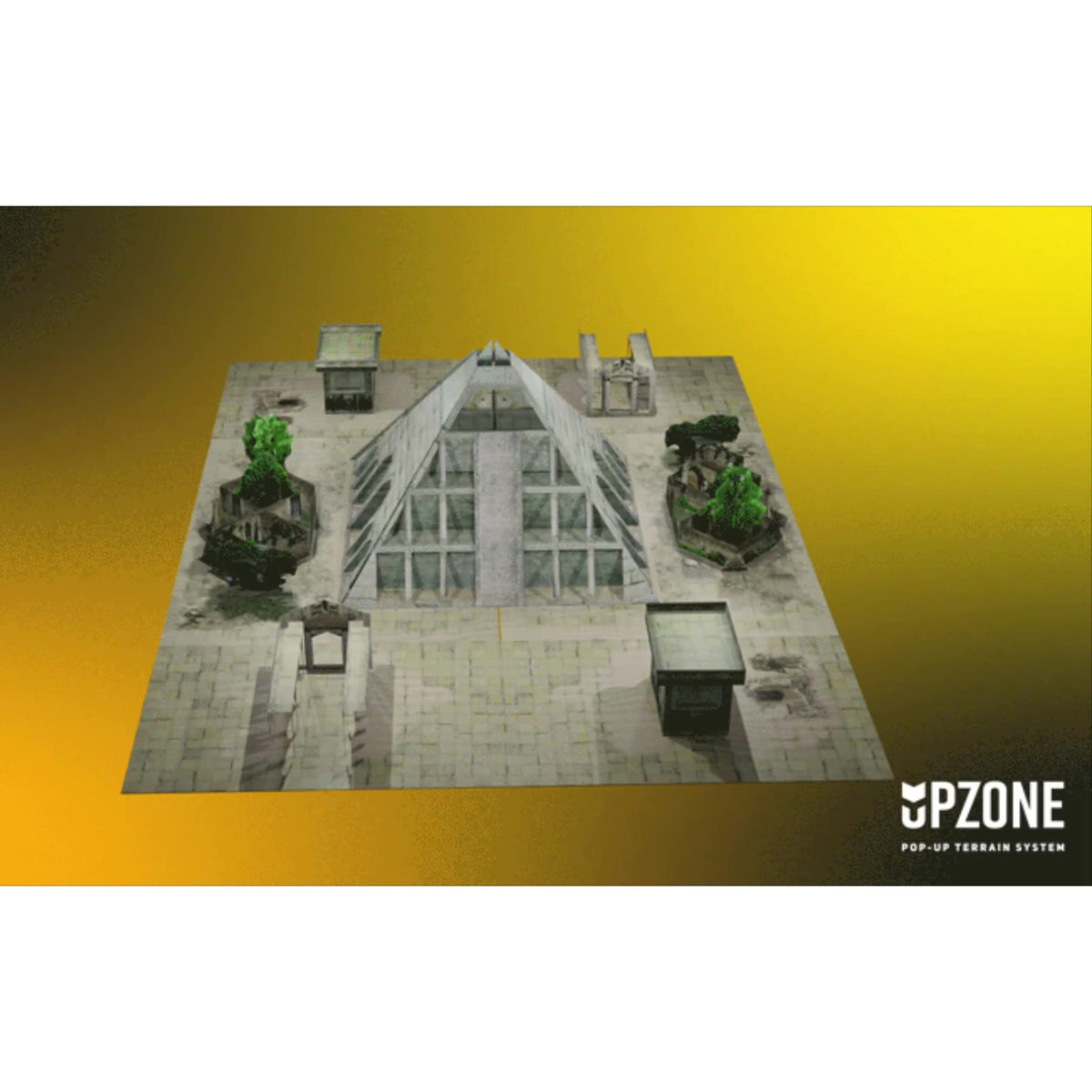 An Upzone Ancient Zone tabletop terrain system features a central pyramid-like building, smaller structures, and green trees on a stone-patterned mat
