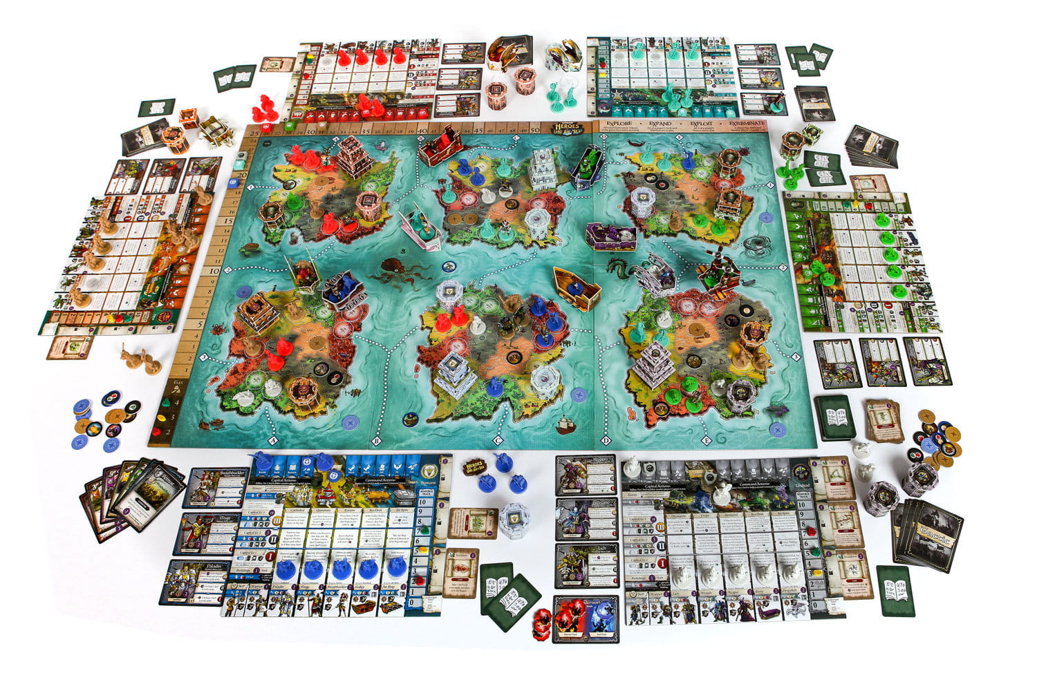 Overhead view of a fully set up fantasy strategy board game with an island map, miniatures, cards, and tokens