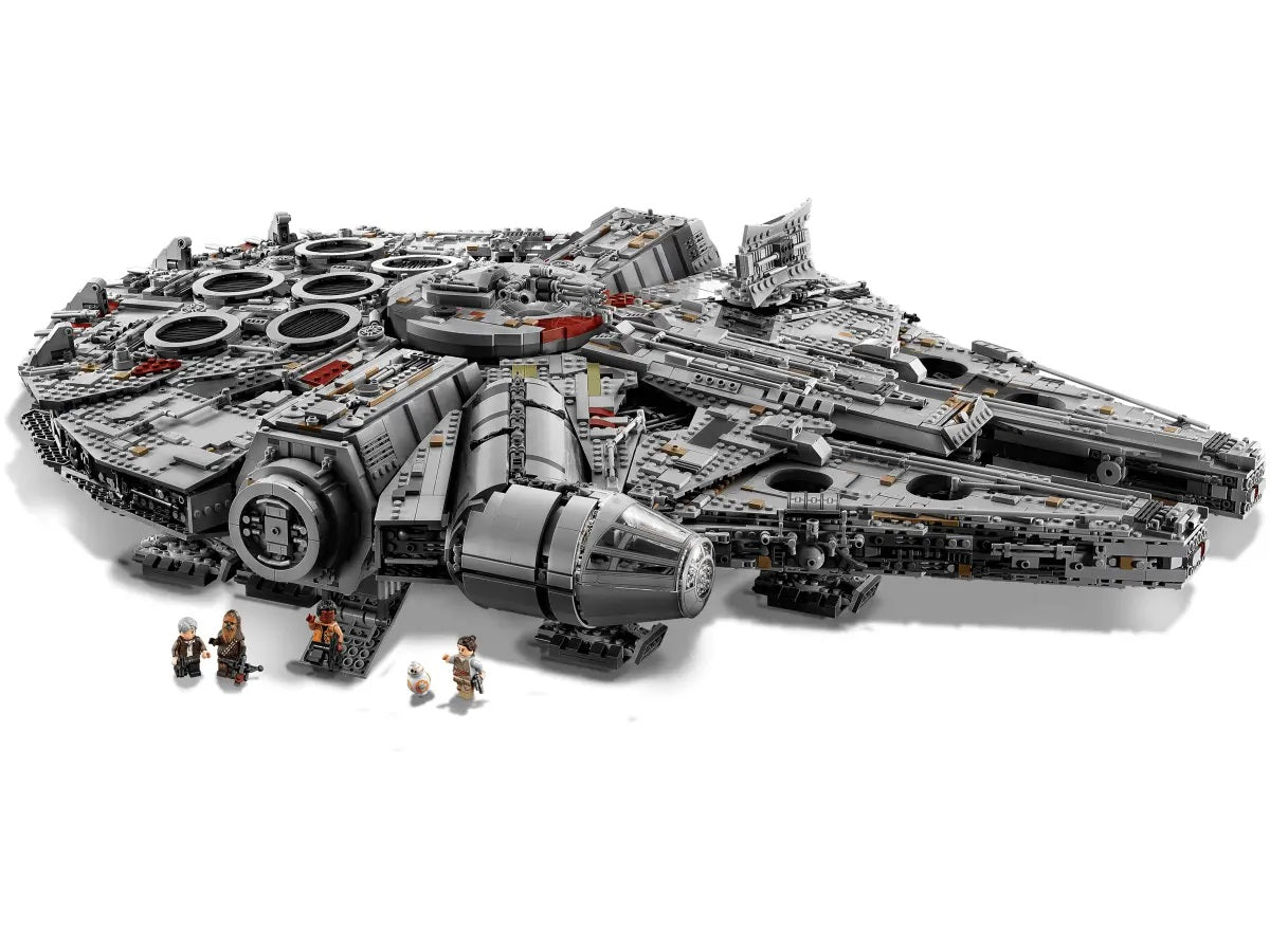 Detailed gray LEGO Millennium Falcon set with several Star Wars minifigures standing below the hull