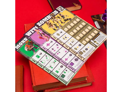 Board game player mats featuring cartoon monsters (Frankenstein, witch) and stats, set diagonally on red books