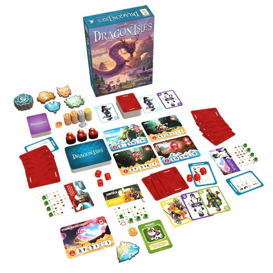 The Dragonisles card game box stands upright showing a red dragon illustration, with all its components spread around including many illustrated cards, resource tokens