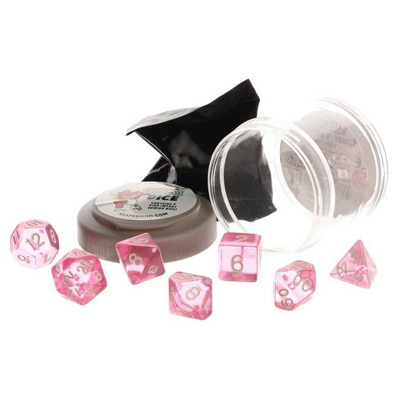 Seven clear pink polyhedral dice are arranged around an open plastic container, a gray lid, and a small black bag