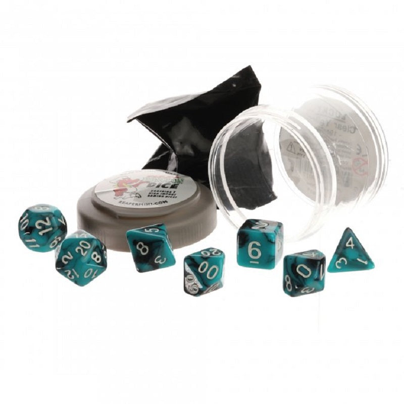 A set of teal and black marbled dungeon dice scattered around an open clear container, a small circular box, and a black wrapper