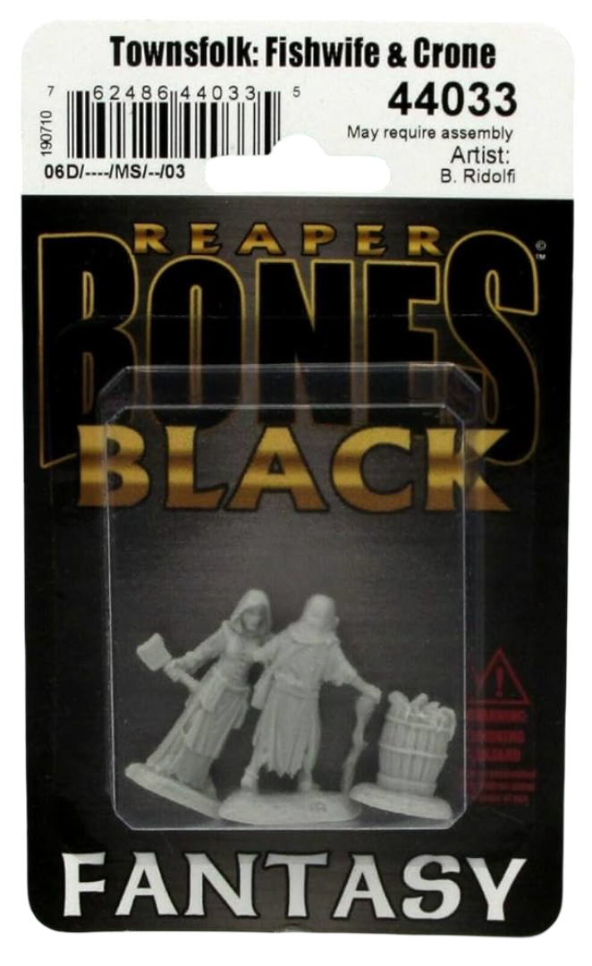Packaged Reaper Bones Black Townsfolk Fishwife & Crone miniatures, featuring a woman with an axe, a hooded figure with a staff, and a fish barrel