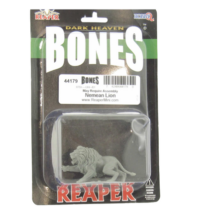 A gray Nemean Lion Bones miniature in a clear blister pack