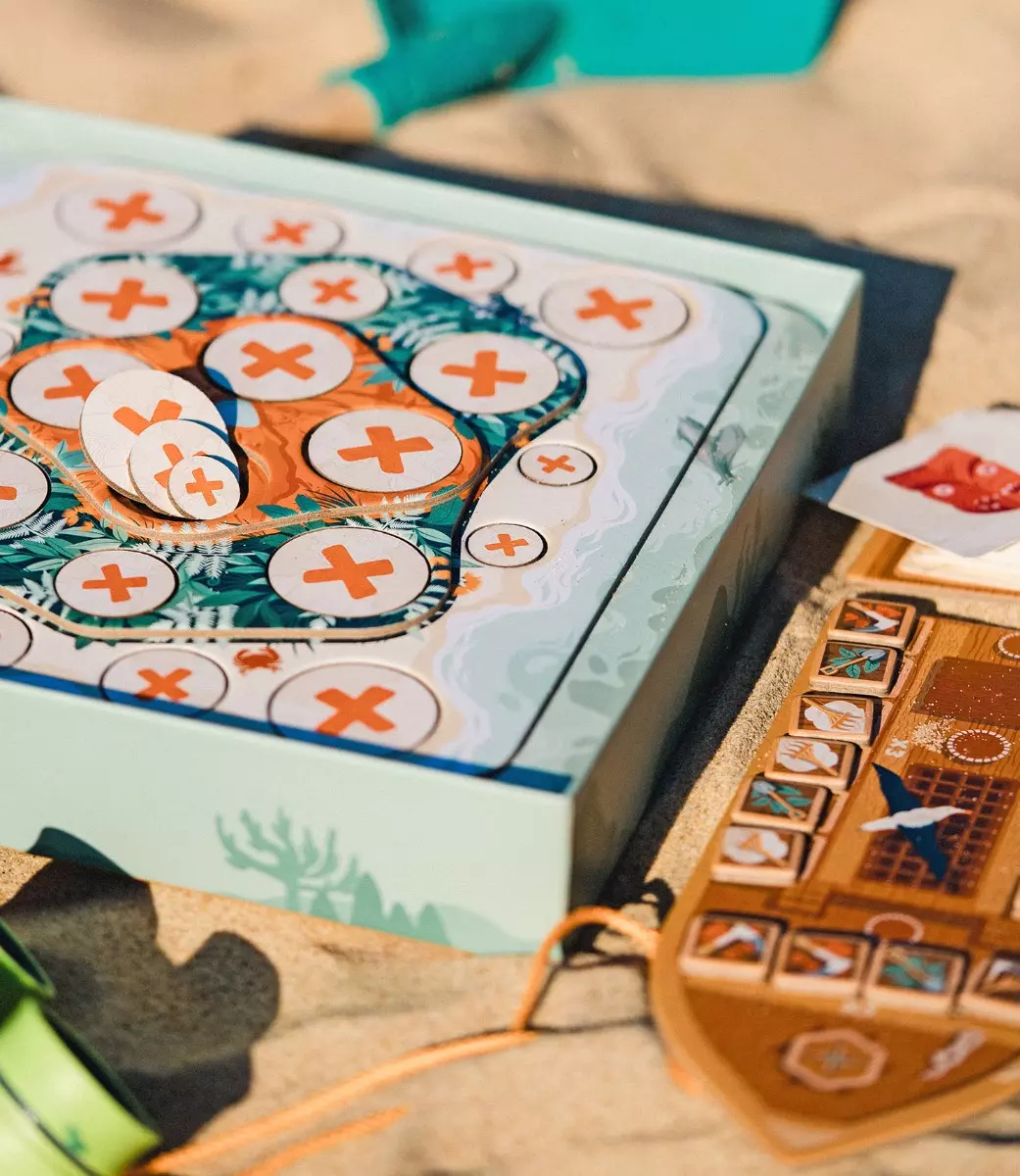 Close-up of Toko Island tokens and board components
