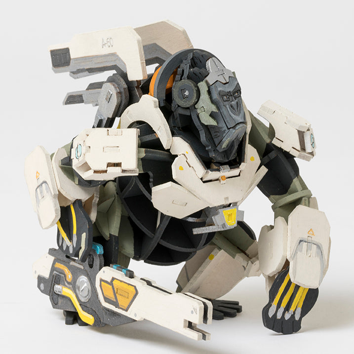 Incredibuilds Overwatch Winston 3D wood model kit and poster featuring the playable hero Winston in crouching pose