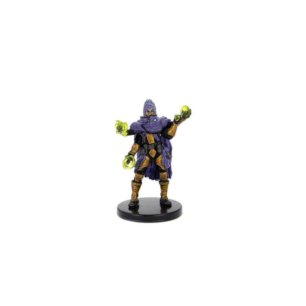 Purple and gold hooded figure miniature conjuring glowing green orbs