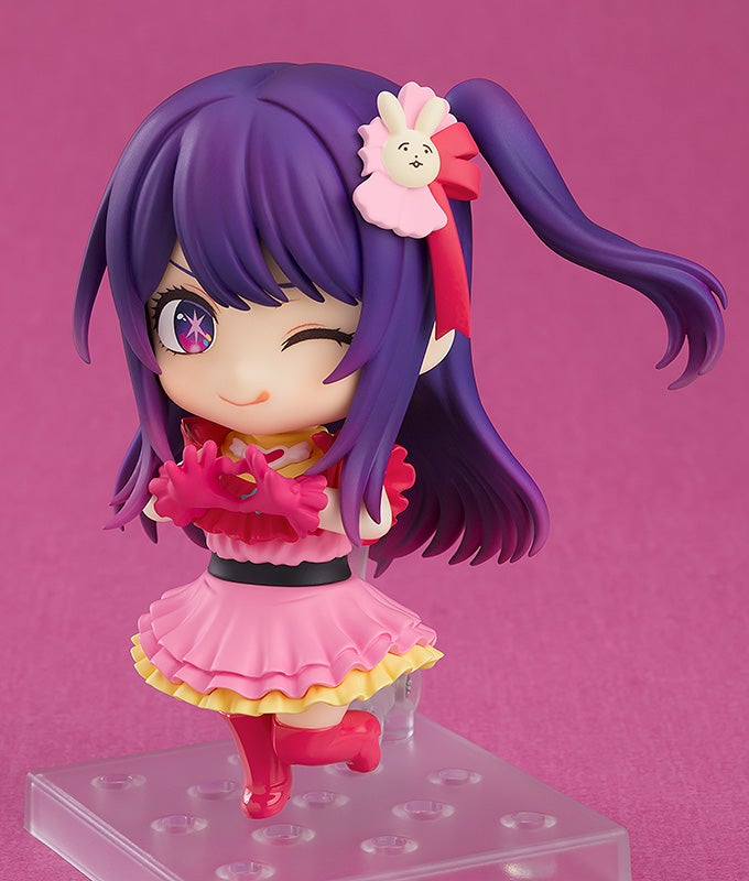 Nendoroid Ai smiling with hand gesture, showcasing expressive faceplate and accessories