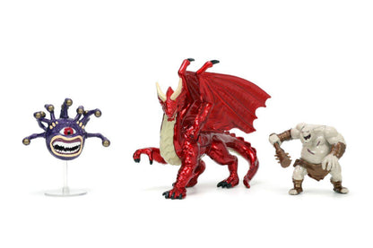 Red dragon, purple Beholder, and ogre plastic miniatures for tabletop fantasy games