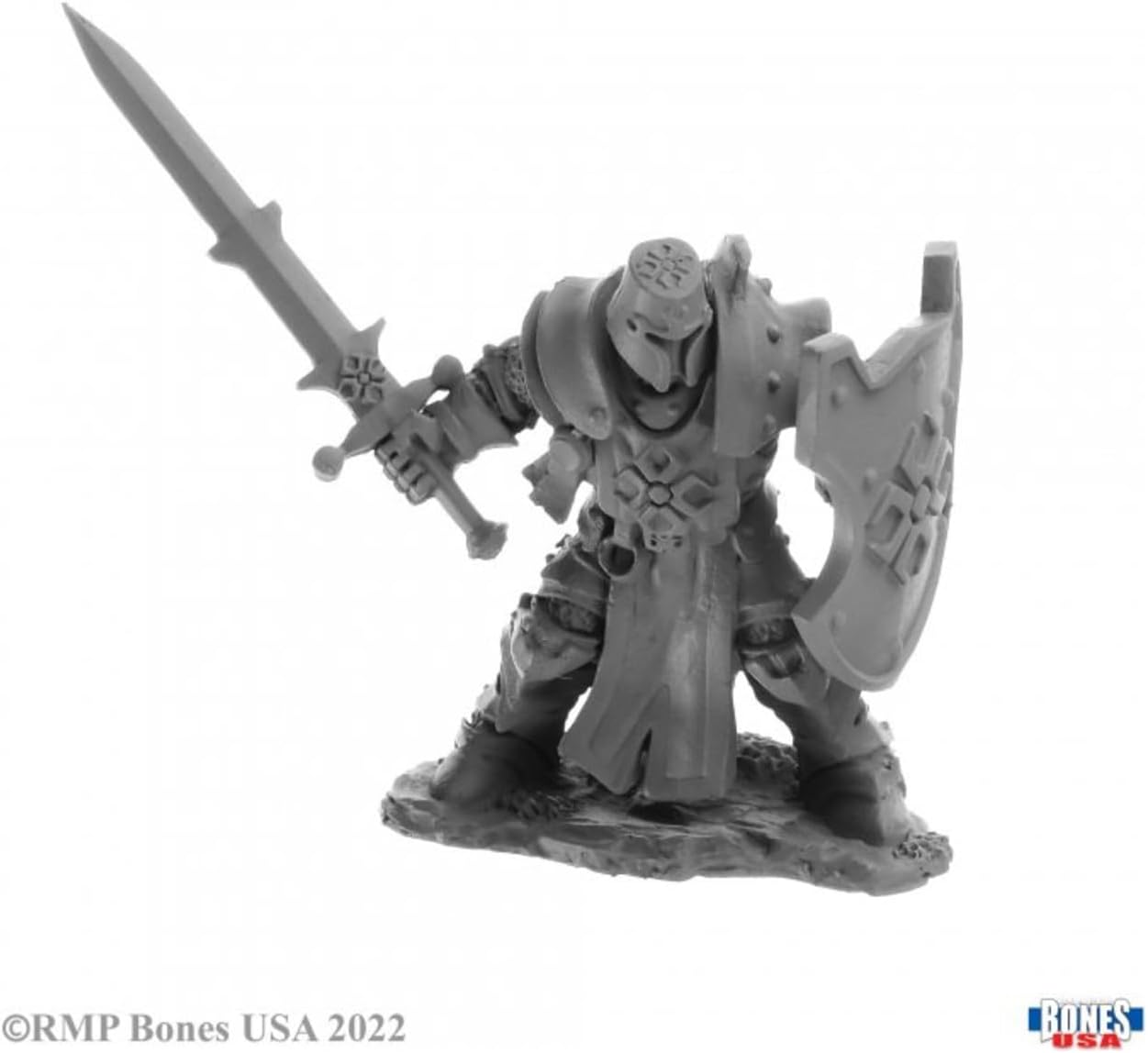 Gray fantasy miniature, heavily armoured knight with raised sword and defensive shield