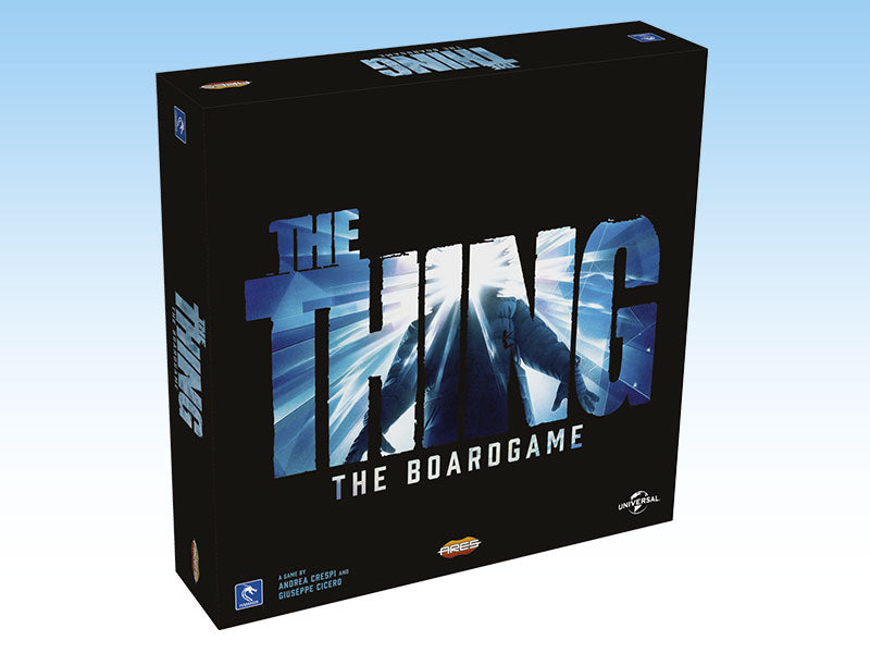 Black board game box, "The Thing The Boardgame," showing a figure backlit by a bright, icy glow