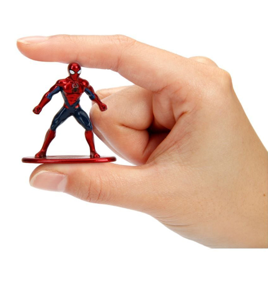 Miniature metallic red and blue Spider-Man figure held between two fingers to show scale